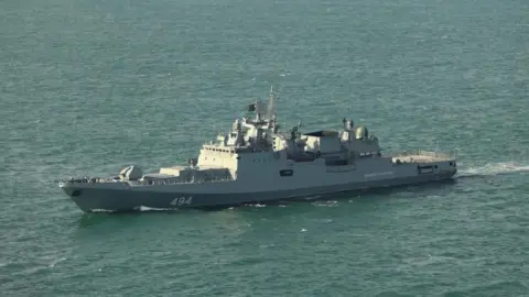 Tensions in the English Channel: Russian Frigate Fires Warning Shots Near UK Yacht