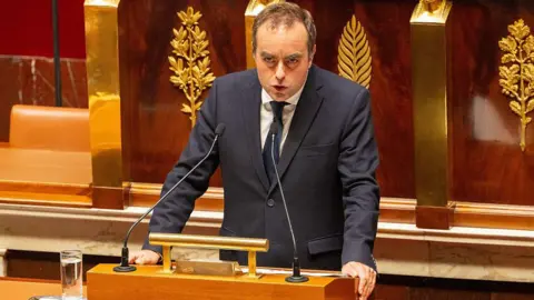 French Prime Minister Proposes Suspension of Pension Reform Amid Government Crisis