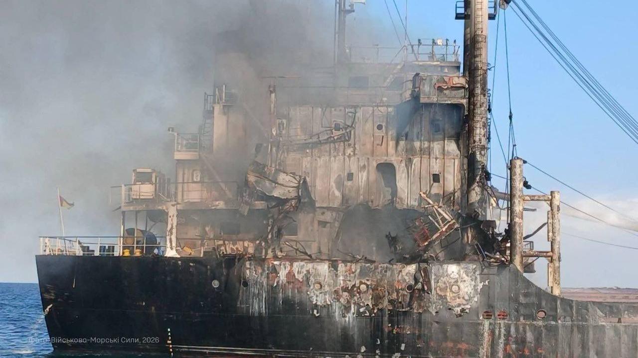 A burning merchant ship