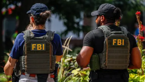 FBI Dismisses Agents for Kneeling at George Floyd Protest Amid Controversy