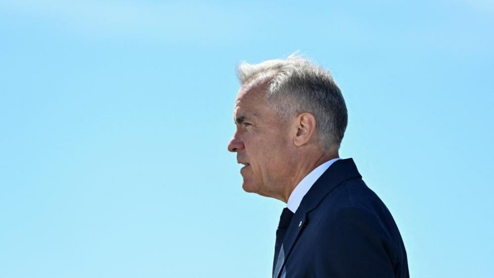 Carney’s Bold Move: How Standing Up to U.S. Tariffs Could Protect Canada’s Green Future