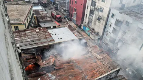 Tragic Fire in Bangladesh Garment Factory Claims at Least 16 Lives
