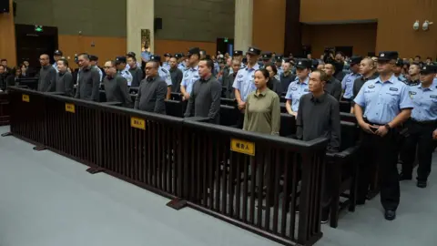 China Imposes Death Sentences on 11 Members of Notorious Ming Family