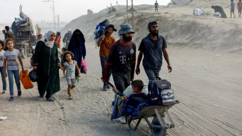 Escalating Crisis: Thousands of Palestinians Flee Gaza City Amid Israeli Ground Offensive