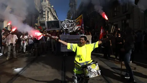 Protests Erupt in France as New Prime Minister Sworn In Amid Budget Cuts