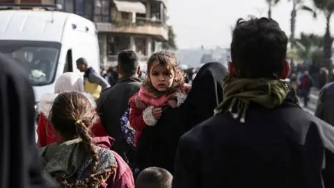 Civilians Flee Aleppo Amid Intensified Clashes Between Syrian Forces and Kurdish Fighters