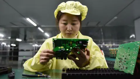 China's Economy Faces Growth Challenges Amid Rising US Trade Tensions