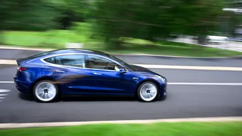 Regulatory Scrutiny for Tesla's Self-Driving Cars Amid Traffic Violations