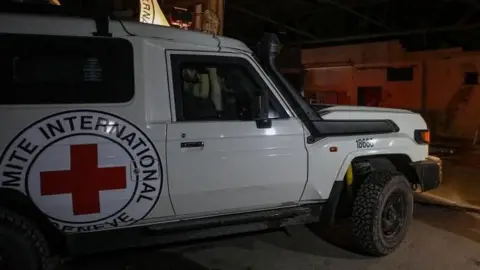 Hamas and Israel Exchange Deceased Hostages Amid Ongoing Ceasefire Tensions