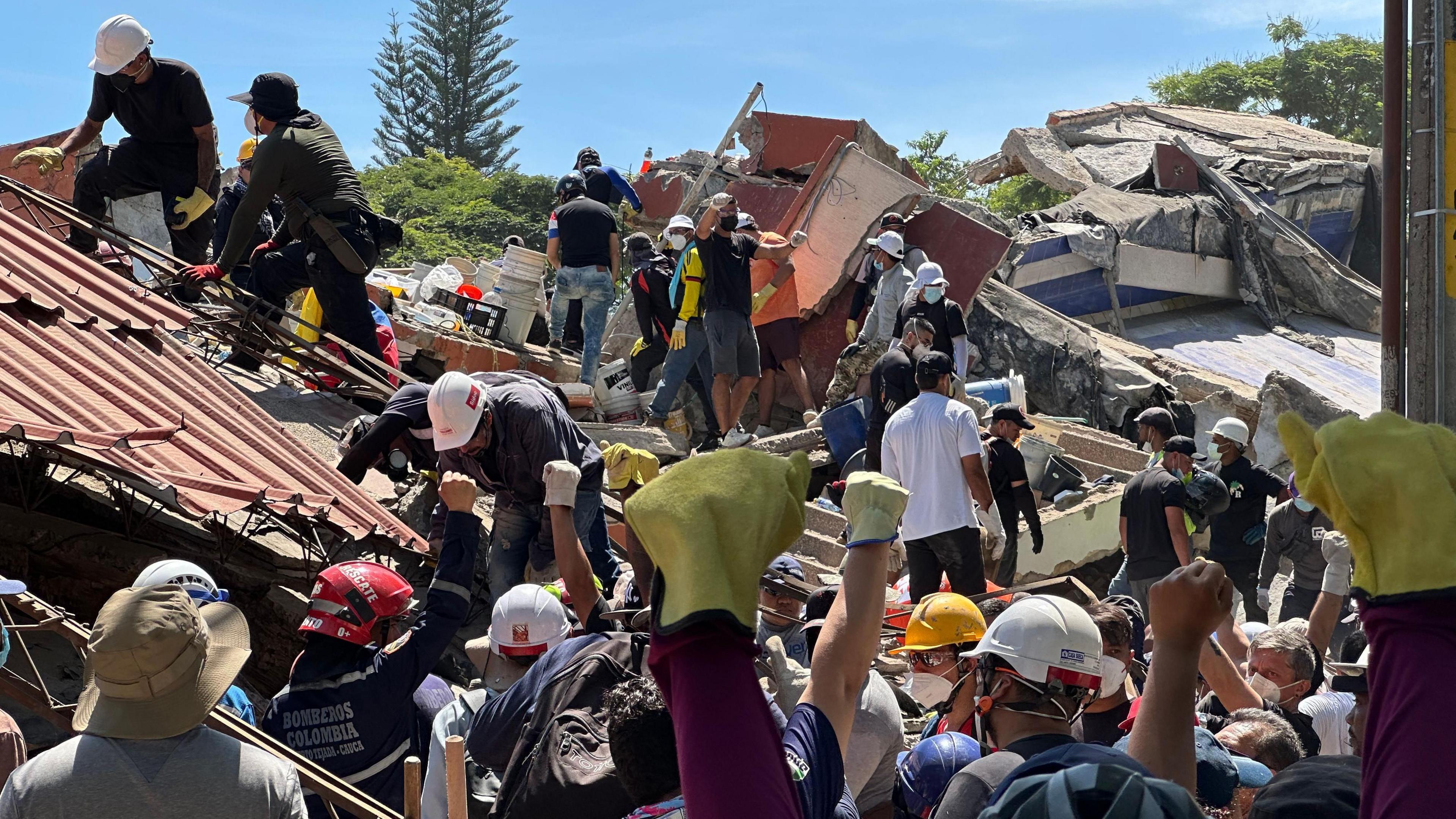 Hope and Heartbreak in Cali: Rescue Efforts Amid Rubble of Collapsed Building