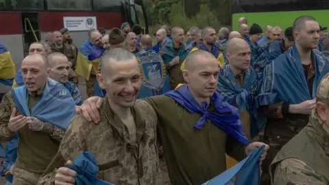 Ukraine Marks Mourning as Prisoner Swap Cools Tensions Following Deadly Russian Strike