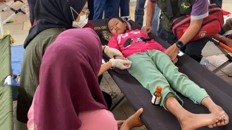 Indonesia's Free School Lunch Program Faces Crisis as Over 1,000 Children Fall Ill