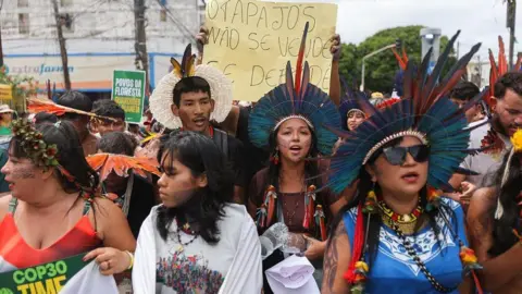 Global Call for Climate Action: Thousands March Outside COP30 Summit in Brazil