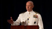A U.S. Navy Admiral testified in Congress, clarifying that the Defense Secretary did not order a second deadly strike on a drug boat in the Caribbean. Lawmakers express concerns about the legality of the military's actions.