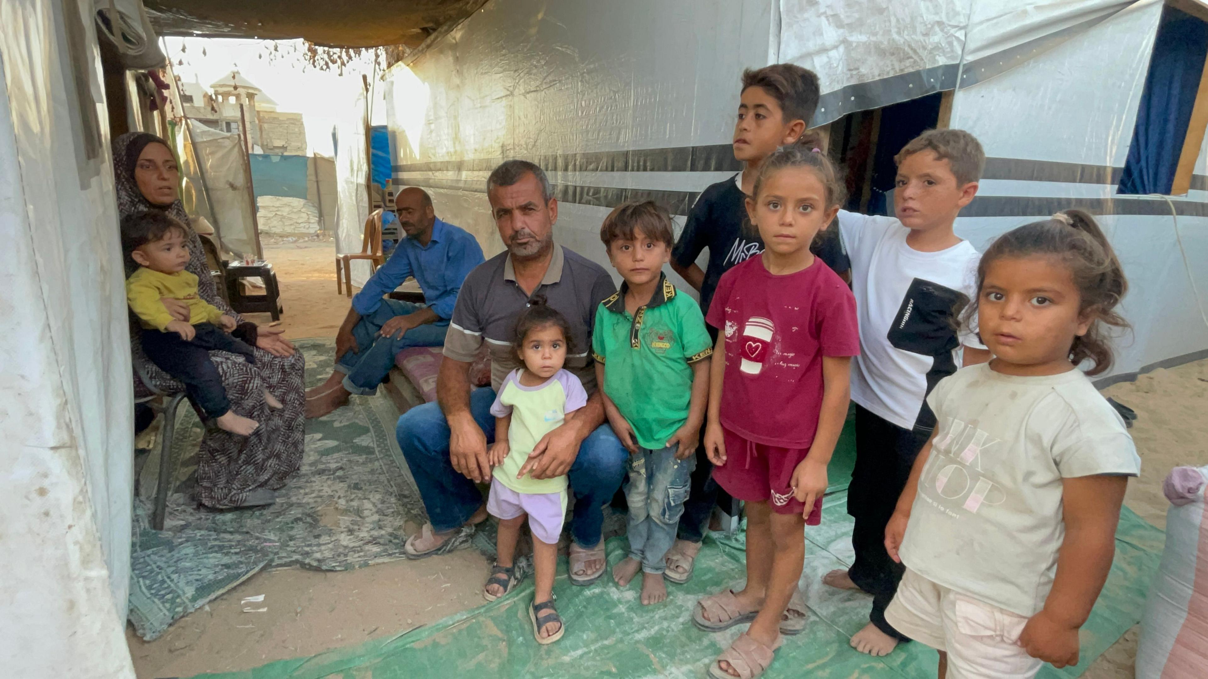 Family in Gaza City waiting for aid
