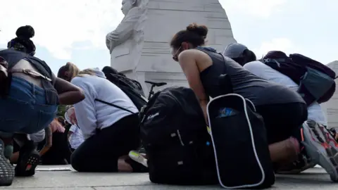 Fired FBI Agents Claim Retribution for Taking a Knee during Protests