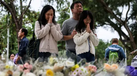 Tragedy in Hong Kong: Fire Death Toll Rises as Community Unites in Mourning