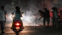 As millions of Indians light up their homes and cities for Diwali, the festival's celebration is contrasted with growing concerns over air pollution and environmental protection measures.