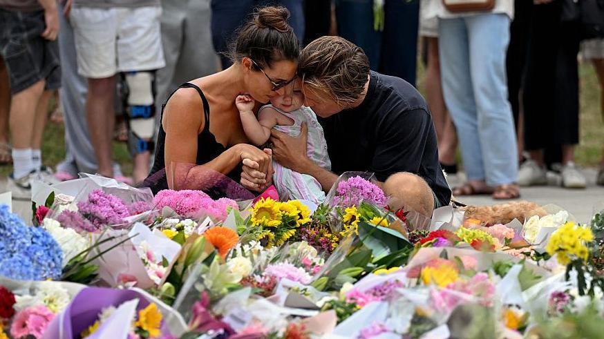 Mourners placed tributes after 15 people were murdered near Bondi Beach