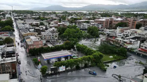 Taiwan Residents Face Catastrophic Flooding as Typhoon Causes Lake to Burst
